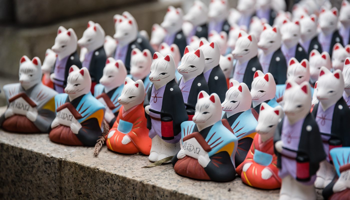 assorted-color cat figurines