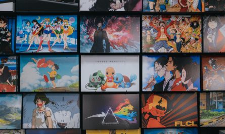 anime character collage photo on black wooden shelf